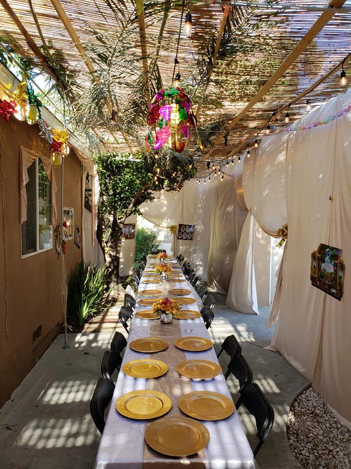 Sukkot at The Malul's, Sukkah and Table - AishLIT Website 5